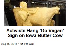 Activists Hang &#39;Go Vegan&#39; Sign on Iowa Butter Cow