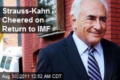 Strauss-Kahn Cheered on Return to IMF