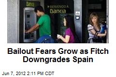 Bailout Fears Grow as Fitch Downgrades Spain