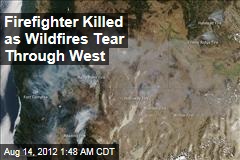 Firefighter Killed as Wildfires Tear Through West