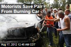 Motorists Save Pair From Burning Car