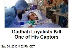 Gadhafi Loyalists Kill One of His Captors