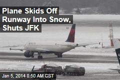 Plane Skids Off Runway Into Snow, Shuts JFK