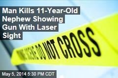 Man Kills 11-Year-Old Nephew Showing Gun With Laser Sight