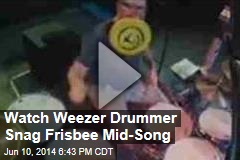 Watch Weezer Drummer Snag Frisbee Mid-Song