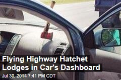 Flying Highway Hatchet Lodges in Car&#39;s Dashboard