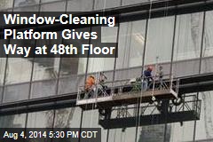 Window-Cleaning Platform Dangles at 48th Floor