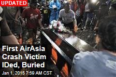 1st AirAsia Crash Victim IDed, Buried