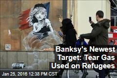 Banksy&#39;s Newest Target: Tear Gas Used on Refugees