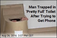 Man Follows Dropped Phone Into Toilet, Gets Stuck