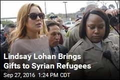 Lindsay Lohan Brings Gifts to Syrian Refugees