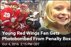 Young Red Wings Fan Gets Photobombed From Penalty Box