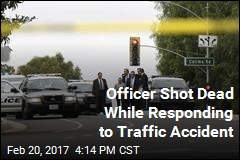 Cop Shot Dead While Responding to Traffic Accident