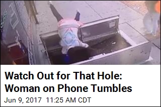 Watch Out for That Hole: Woman on Phone Tumbles