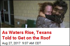 As Waters Rise, Texans Told to Get on the Roof