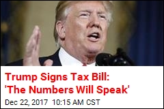 Trump Signs Tax Overhaul Into Law