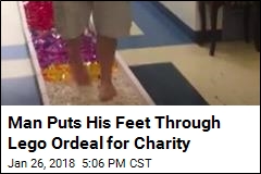 Man Puts His Feet Through Lego Ordeal for Charity