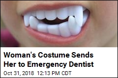 Woman&#39;s Halloween Fangs Get Stuck on Her Teeth