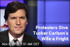 Protesters Give Tucker Carlson&#39;s Wife a Fright