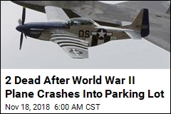 World War II Fighter Plane Fatally Crashes Into Parking Lot