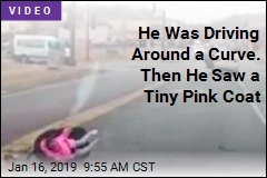 He Was Driving Around a Curve. Then He Saw a Tiny Pink Coat