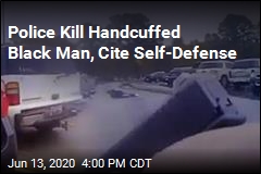 Video Shows Cop Shooting Handcuffed Black Man