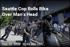 Seattle Cop Rolls Bike Over Protester&#39;s Head