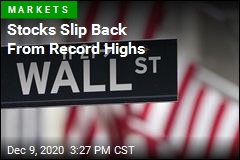 Stocks Slip Back From Record Highs