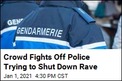 Crowd Ignores Virus Curfew, Police Trying to Stop Rave