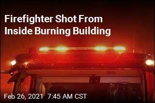 Firefighter Shot From Inside Burning Building