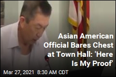 Asian American Official Bares Chest at Town Hall: &#39;Here Is My Proof&#39;