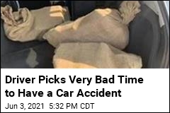 Driver Picks Very Bad Time to Have a Car Accident