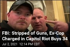 FBI: Stripped of Guns, Ex-Cop Charged in Capitol Riot Buys 34