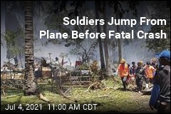 Plane Carrying Troops to Combat Crashes, Killing Dozens
