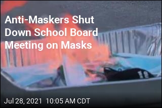 Fla. School Board Delays Talk on Masks as Protesters Burn Them