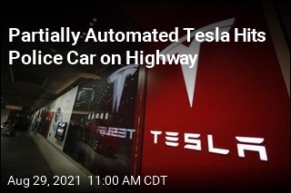 Partially Automated Tesla Hits Police Car on Highway