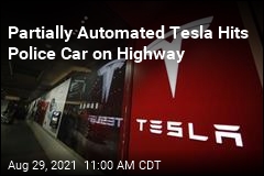 Partially Automated Tesla Hits Police Car on Highway