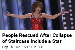 Reba McEntire Climbs Down After Staircase Collapses