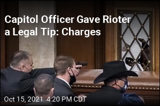 Capitol Officer Gave Rioter a Legal Tip: Charges