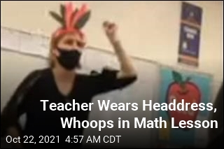 Teacher Wears Headdress, Whoops in Math Lesson