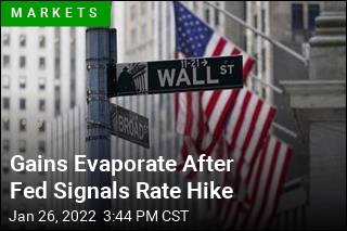 Stocks Give Up Gains After Fed Signals Rate Hike