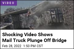 Shocking Video Shows Mail Truck Plunge Off Bridge