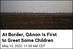 At Border, QAnon Is First to Greet Some Children