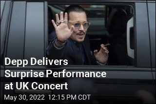 Depp Makes Surprise Appearance at UK Concert