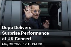 Depp Makes Surprise Appearance at UK Concert