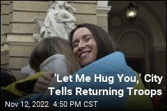&#39;Let Me Hug You,&#39; City Tells Returning Troops