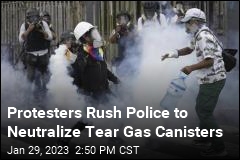 In Peru, &#39;Deactivators&#39; Run Toward Tear Gas