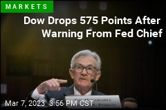Wall Street Tumbles After Warning From Fed Chief