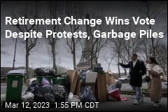 Retirement Change Wins Vote Despite Protests, Garbage Piles