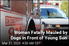 Woman Fatally Mauled by Dogs in Front of Young Son